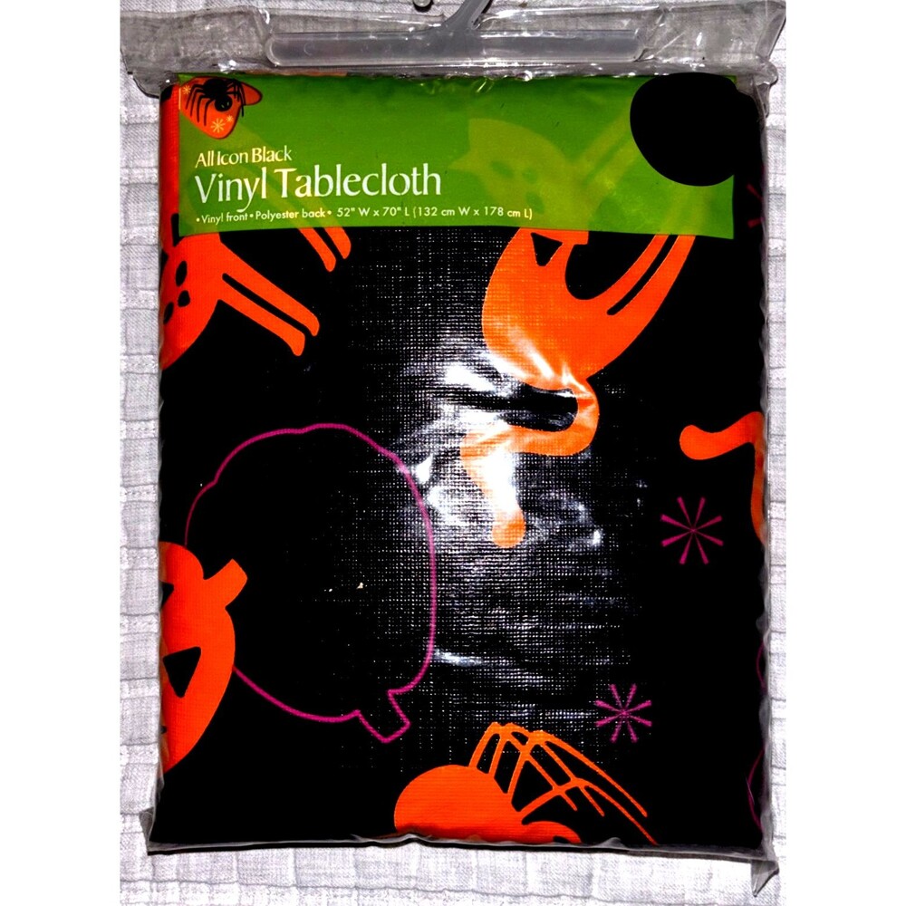 Halloween Trick or Treat Vinyl Tablecloth 52" x 70" with 100% Polyester backing.